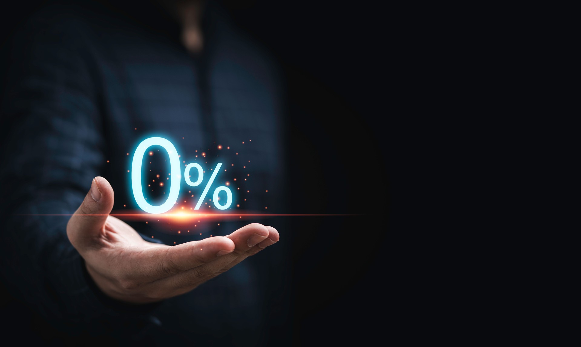 Businessman holding zero percentage on hand with copy space for sale discount promotion for Black Friday and merry Christmas happy new year period.